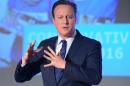 British Prime Minister, and leader of the Conservatives, David Cameron addresses delegates during the Conservative party Spring Forum in central London on April 9, 2016