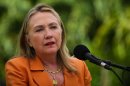 U.S. Secretary of State Hillary Rodham Clinton speaks during a joint press conference with New Zealand Prime Minister John Key at the New Zealand high commissioner's house in Rarotonga, Cook Islands, Friday, Aug. 31, 2012. (AP Photo/Jim Watson, Pool)
