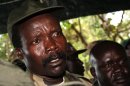 FILE - In this Nov. 12, 2006, file photo, the leader of the Lord's Resistance Army Joseph Kony answers journalists' questions following a meeting with UN humanitarian chief Jan Egeland at Ri-Kwangba in southern Sudan. A report by the watchdog group Resolve on Friday, April 26, 2013, says the fugitive African warlord Joseph Kony recently found safe haven in territory along the Sudan-South Sudan border, controlled by Sudan and that Kony benefits from Sudanese military support. (AP Photo/Stuart Price, File, Pool)