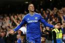 Chelsea's Fernando Torres celebrates scoring a goal against Manchester City during their English Premier League soccer match at Stamford Bridge in London
