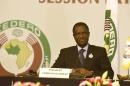 Kadre Desire Ouedraogo, commission president of the Economic Community of West African States, delivers the opening speech of the ECOWAS head of states extaordinary summit, on September 12, 2015 in Dakar