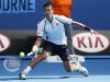 Novak Djokovic of Serbia hits a return to Radek Stepanek of Czech Republic during their men's singles match at the Australian Open tennis tournament in Melbourne