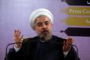 Iranian President Hassan Rouhani speaks during a press conference in the capital Tehran on June 14, 2014