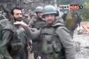 This image taken from video obtained from Ugarit News on Thursday, Feb. 7, 2013, which has been authenticated based on its contents and other AP reporting, purports to show Syrian soldiers dancing to Usher's hit song "Yeah!" The video posted online purportedly shows Syrian soldiers taking a break from the country's civil war by bouncing around to the American R&B star's hit song. In the clip uploaded to YouTube, a group of soldiers dressed in camouflage combat gear _ some carrying automatic rifles, others with rocket-propelled grenades poking out of their flak jackets _bob and sway to the music (AP Photo/Ugarit News via AP video)
