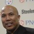 FILE - In a Tuesday, March 20, 2012 file photo, former Pittsburgh Steelers receiver Hines Ward answers a question after announcing his retirement from the NFL at the Steeler's offices in Pittsburgh. Joshua Van Auker, 26, of Pittsburgh, who claims his girlfriend once had a “physical relationship” with retired Pittsburgh Steelers wide receiver Hines Ward, was in custody Friday, Oct. 19, 2012 on charges he tried to extort $15,000 from the player by threatening to release evidence the player had paid for sex. Van Auker was awaiting arraignment on two felony counts of attempted extortion. Van Auker was arrested Thursday in Pittsburgh by detectives from the Allegheny County District Attorney's Office after he allegedly met with Ward's personal assistant, Raymond Burgess, who paid him the money in exchange for unspecified “materials” in an envelope that Van Auker said could prove his claims, according to a five-page criminal complaint. (AP Photo/Gene J. Puskar, File)