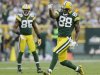 Green Bay Packers' Greg Jennings (85) watches as Jermichael Finley (88) celebrates a catch during the second half of an NFL football game against the Minnesota Vikings Sunday, Dec. 2, 2012, in Green Bay, Wis. The Packers won 23-14. (AP Photo/Morry Gash)