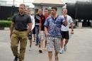 Russian sailors arrive at the Federal High Court in Lagos on June 18, 2013