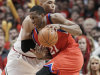 Philadelphia 76ers forward Thaddeus Young (21) drives to the basket against Chicago Bulls forward Taj Gibson during the third quarter of Game 2 in an NBA basketball first-round playoff series, in Chicago on Tuesday, May 1, 2012. (AP Photo/Nam Y. Huh)