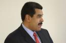 Maduro reacts during a meeting at the Planalto Palace in Brasilia