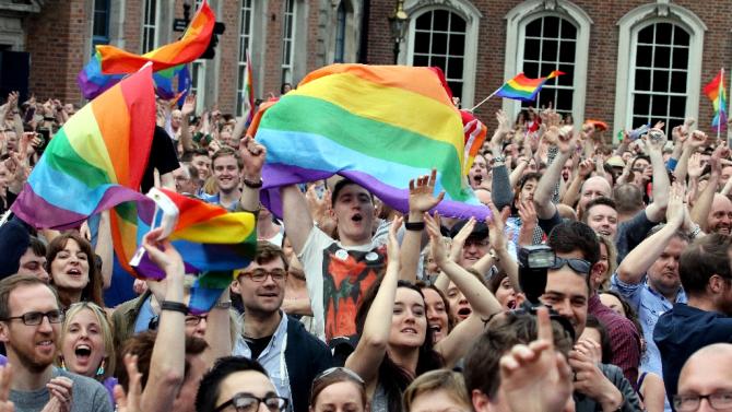 Supporters outside Dublin Castle cheer the result of the same-sex marriage referendum on May 23, 2015