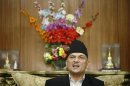 Nepalese PM Baburam Bhattarai addresses the nation from his official residence to declare fresh elections for November 22, 2012 for the Himalayan republic after political parties failed to finalize the new constitution, in Kathmandu