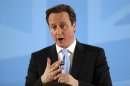 Britain's Prime Minister David Cameron delivers a speech on immigration at the University Campus Suffolk, in Ipswich