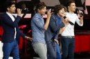 One Direction performs at the closing ceremony of the London 2012 Olympic Games at the Olympic stadium
