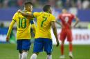 Brazil's Douglas Costa (R) and Neymar (L), pictured on June 14, 2015, are heading a young Brazil Olympic football squad for the Rio Games