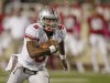 Ohio State quarterback Braxton Miller runs for a first down during the first half of an NCAA college football game against Indiana in Bloomington, Ind., Saturday, Oct. 13, 2012. (AP Photo/Sam Riche)