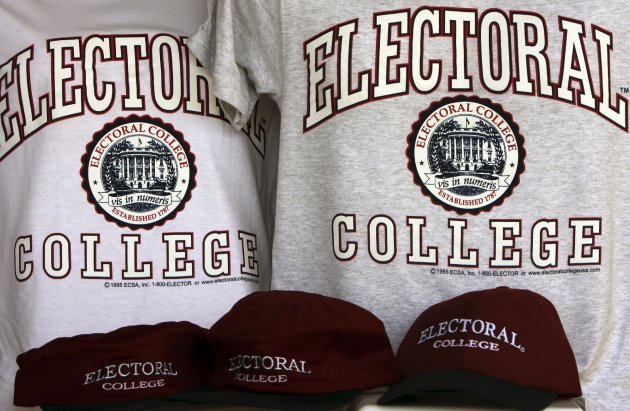 FILE - In this Oct. 28, 2008 file photo, sportswear bearing the name of a college that doesn't exist: the Electoral College, are seen in Glenburn, Maine, on Tuesday, Oct. 28, 2008. When it comes to voting for president, not all votes are created equal. Chances are yours will count less than a select few. Each state’s Electoral College votes are based on the size of its congressional delegation, not its population. Because of that, a presidential vote in Wyoming mathematically counts more than three times as much as a vote in Ohio, at least in terms of choosing electors.(AP Photo/Pat Wellenbach, File)