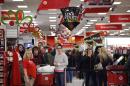 Target shoppers wait to check out on Black Friday, Nov. 28, 2014, in South Portland, Maine. The store opened at midnight. (AP Photo/Robert F. Bukaty)