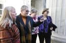 Plaintiffs challenging Oklahoma's gay marriage ban arrive in court following a hearing at the 10th U.S. Circuit Court of Appeals in Denver, Thursday, April 17, 2014. They are, left to right, Dr. Gay Phillips, her partner Sue Barton, Sharon Baldwin and her partner Mary Bishop. The court is to decide whether to overturn a federal judge's decision to strike down. (AP Photo/Brennan Linsley)