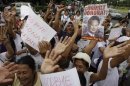 Protesters jubilate during a rally near the Philippine Senate in Manila, Philippines on Tuesday May 29, 2012. Philippine senators voted to convict Chief Justice Renato Corona during a historic impeachment trial that lasted five months. (AP Photo/Aaron Favila)