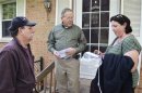 Canvassers and activists Jim Lewis and Ann Becker go door to door in Middletown