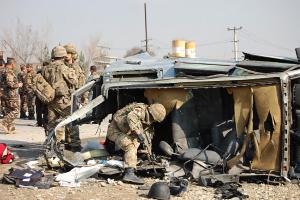 Troops inspect a British embassy vehicle which was &hellip;