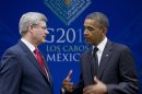 President Barack Obama gestures as he speaks during a bilateral meeting with Canada's Prime Minister Stephen Harper during the G20 Summit, Tuesday, June 19, 2012, in Los Cabos, Mexico. (AP Photo/Carolyn Kaster)