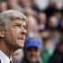 Arsenal's manager Wenger reacts before their English Premier League soccer match against Queens Park Rangers at Loftus Road in London
