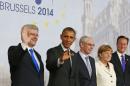 Leaders pose for a group photo during a G7 meeting at European Council headquarters in Brussels