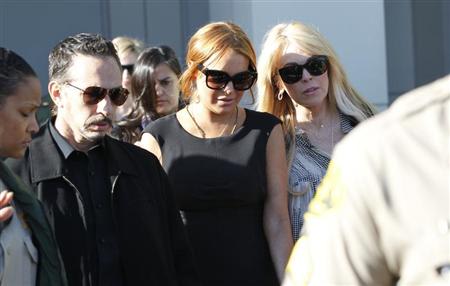 Lohan, with her mother Dina Lohan, leaves a probation violation hearing at Airport Branch Courthouse in Los Angeles