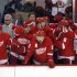 The Detroit Red Wings bench celebrate an empty net goal by Daniel Cleary against the Chicago Blackhawks in the final minute of Game 4 of their NHL Western Conference semi-finals hockey playoff game in Detroit