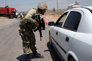A Turkish soldier check cars at a checkpoint in Diyarbakir, &hellip;