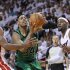 Boston Celtics' Pierce is defended by Miami Heat's Wade and James in Eastern Conference Finals NBA basketball playoff series in Miami