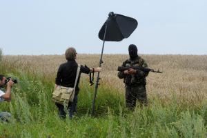 A masked armed separatist militant poses for a photographer&nbsp;&hellip;