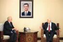 Syria's Foreign Minister Walid Moualem meets UNICEF)Director Anthony Lake in Damascus