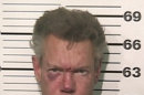 FILE - This file photo provided by the Grayson County, Texas, Sheriffâ€™s Office shows Country singer Randy Travis. A prosecutor says the country music star is expected to enter a guilty plea in a drunken-driving case in North Texas. (AP Photo/Grayson County Sheriff's Office)