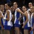 Russia's players huddle around their coach Sergei Ovchinnikov during their women's Group A volleyball match against Britain at the London 2012 Olympic Games at Earls Court in London