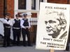 A pro-Julian Assange placard is seen outside the Embassy of Ecuador, in central London, Saturday August 18, 2012, where Wikileaks founder Julian Assange is claiming asylum in an effort to avoid extradition to Sweden.  Authorities in Sweden want to question Assange over allegations made by two women who accuse him of sexual misconduct during a visit to the country in mid-2010, but Assange asserts that the US will try to extradite him from Sweden to answer allegations relating to the WikiLeaks publication of US secrets. (AP Photo / Dominic Lipinski/PA) UNITED KINGDOM OUT - NO SALES - NO ARCHIVES