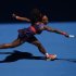 Serena Williams of the U.S. hits a return to Ayumi Morita of Japan during their women's singles match at the Australian Open tennis tournament in Melbourne