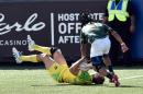 Ed Jenkins (L) of Australia lies on his back after an illegal hit by Rosko Specman of South Africa causing a penalty try on March 6, 2016 in Las Vegas, Nevada