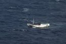 A boat believed to be carrying up to 180 asylum-seekers sails towards Australian waters in July 2012