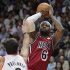 Portland Trail Blazers' Pavlovic defends as Miami Heat's James shoots in the first half of their NBA basketball game in Miami, Florida