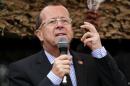 U.N. special envoy to Congo, Kobler, addresses troops during a special parade in the eastern DRC