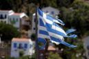 A tattered Greek flag flutters in the village of Meyisti on the Island of Kastellorizo which is the most easterly of the islands in Greece