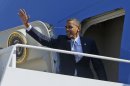 President Barack Obama waves as he boards Air Force One before his departure from Andrews Air Force Base, Sunday, Sept., 30, 2012. Obama is traveling to Las Vegas for a campaign rally then will be staying in Nevada to prepare for the first presidential debate with Republican rival, former Massachusetts Gov. Mitt Romney, on Wednesday, Oct. 3, 2012. (AP Photo/Pablo Martinez Monsivais)