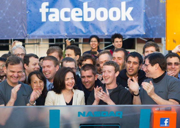 <p>               In this image provided by Facebook, Facebook founder, Chairman and CEO Mark Zuckerberg, center, applauds at the opening bell of the Nasdaq stock market, Friday, May 18, 2012, from Facebook headquarters in Menlo Park, Calif. The social media company priced its IPO on Thursday at $38 per share, and beginning Friday regular investors will have a chance to buy shares. (AP Photo/Nasdaq via Facebook, Zef Nikolla)