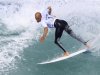 Ten-time ASP World Surfing Champuion Slater surfs during the men's Association of Surfing Professionals Billabong Rio Pro championship in Rio de Janeiro