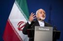 Iran's Foreign Minister Javad Zarif gestures as he speaks during a news conference in Lausanne
