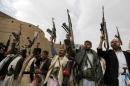 Armed Houthi followers demonstrate against Saudi-led air strikes in Yemen's capital Sanaa