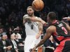 Brooklyn Nets' Deron Williams (8) passes away from Toronto Raptors' Kyle Lowry (3) during the first half of an NBA basketball game, Saturday, Nov. 3, 2012, in New York. (AP Photo/Frank Franklin II)