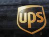 A United Parcel Service logo is seen on a car in center of Warsaw